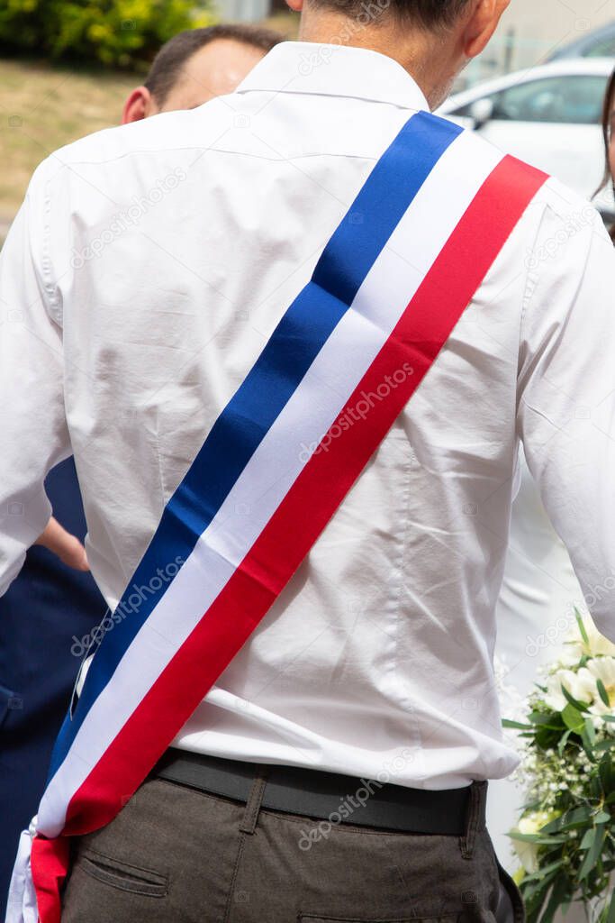 back rear view of french mayor of the city during an official celebration