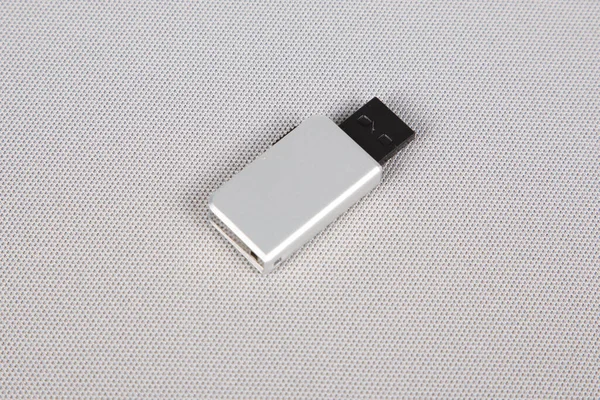 usb key flash drive silver on white background