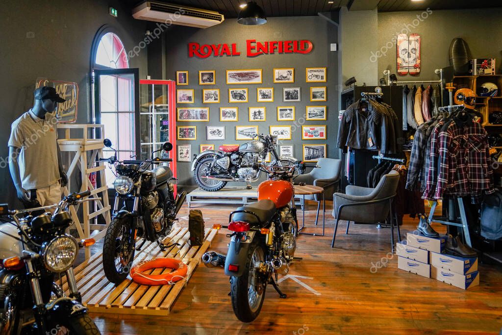 Bordeaux , Aquitaine / France - 10 10 2020 : Royal Enfield motorcycle logo and text sign dealership store interior of vintage motorbike