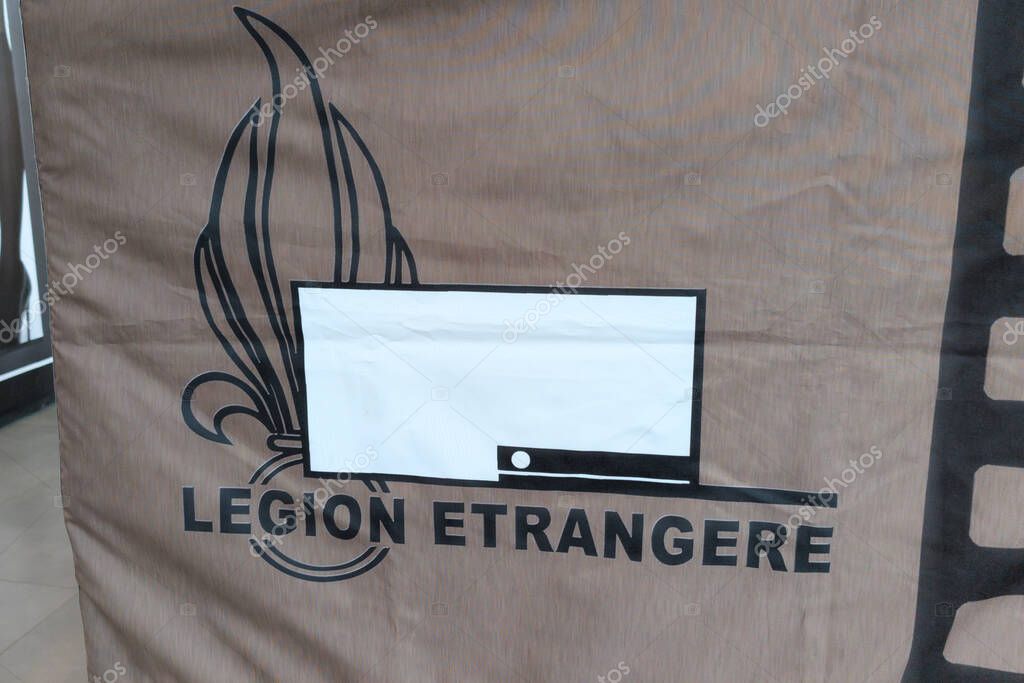 Bordeaux , France -  09 15 2025 : legion etrangere hat flag cap white text sign and logo brand of french  legion foreign military service on the world globe