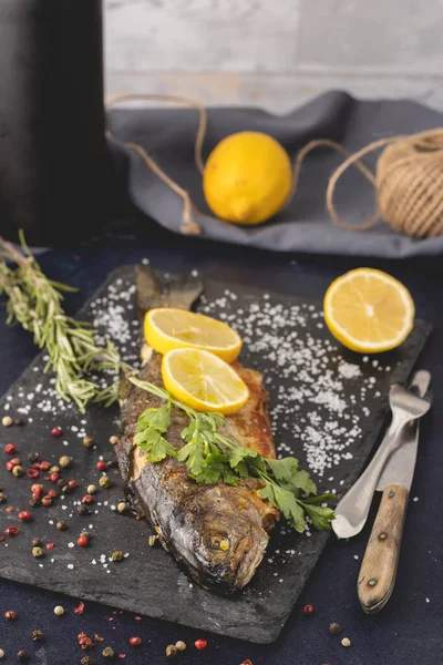 Grilled Trout Olive Oil Rosemary Pepper Salt Lemon Placed Dark — Stock Photo, Image