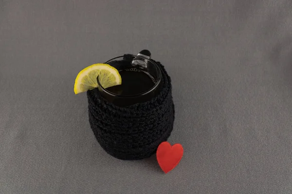 Tea Lemon Wrapped Warm Black Sweater Red Heart — Stock Photo, Image