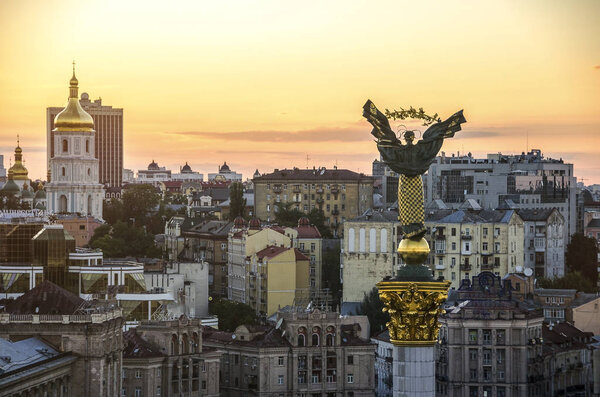 View of the street Khreshchatyk and Independence Square in Kiev from a bird's eye view. Monument of Independence at sunset time