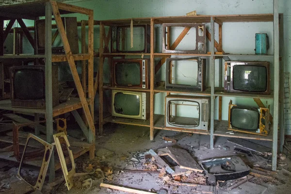 Chair and old TV in Pripyat ghost town, Chernobyl Nuclear Power Plant Zone of Alienation, Ukraine