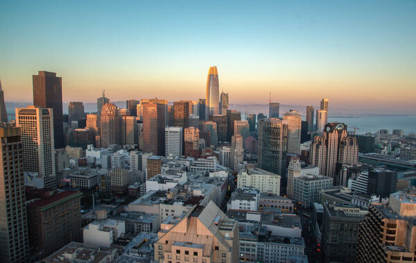 Beautiful view of business center in downtown San Francisco at sunset