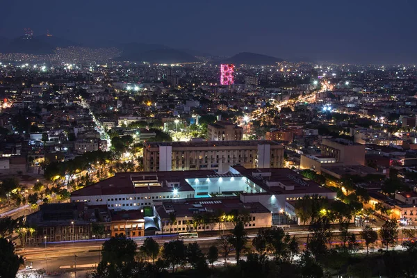 Panoramic view of Mexico city downtown skyscrappers at sunset time before night.