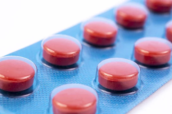 Red Pills Blue Plastic Pack Blister Global Pharmaceutical Industry Billions — Stock Photo, Image