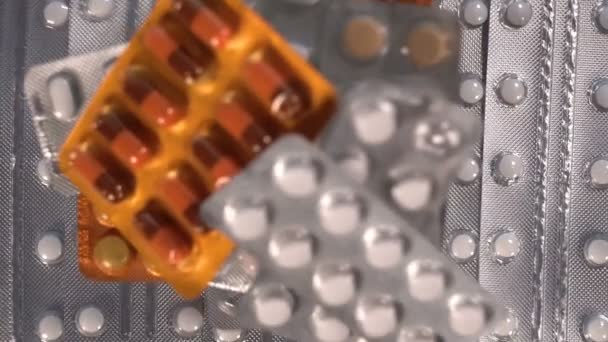 Different Colorful Blisters Falling Plastic Packs Global Pharmaceutical Industry Billions — Stock Video