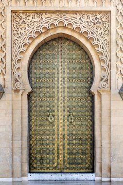 Door at the Mausoleum of Mohammed V. The Mausoleum of Mohammed V is a mausoleum located on the opposite side of the Hassan Tower, on the Yacoub al-Mansour esplanade in Rabat, Morocco. clipart