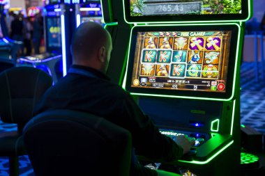 Slot machines in casino clipart