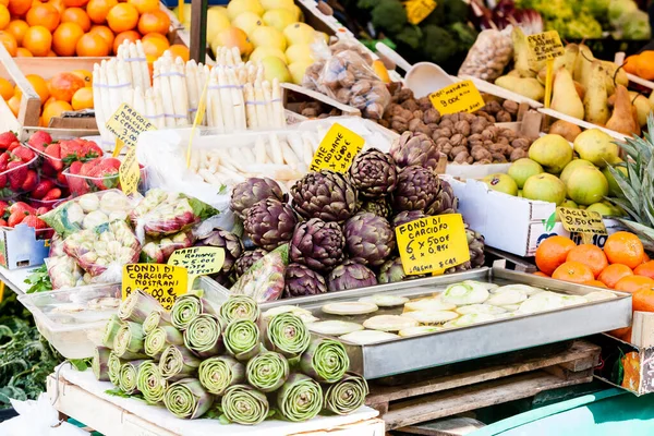 Farmers food market with fresh, varied, seasonal, organic vegetables and fruits.