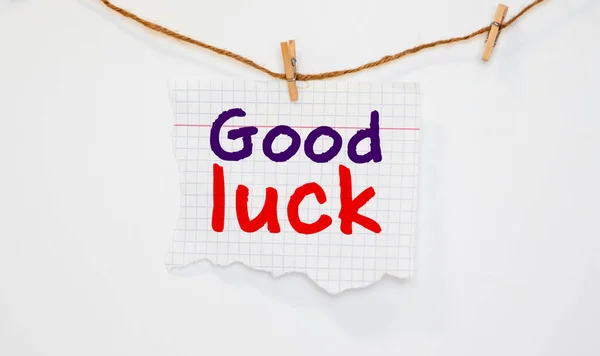 good luck message. Good luck word on note paper