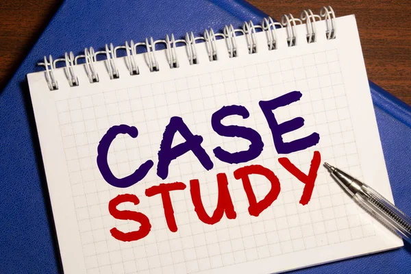 Case study memo written on a notebook with pen.