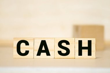 CASH FLOW mektup bloğu ve para yığını, iş konsepti.