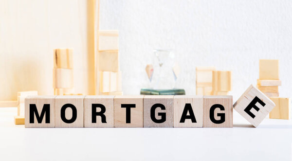 MORTGAGE word concept on wooden blocks, business concept.