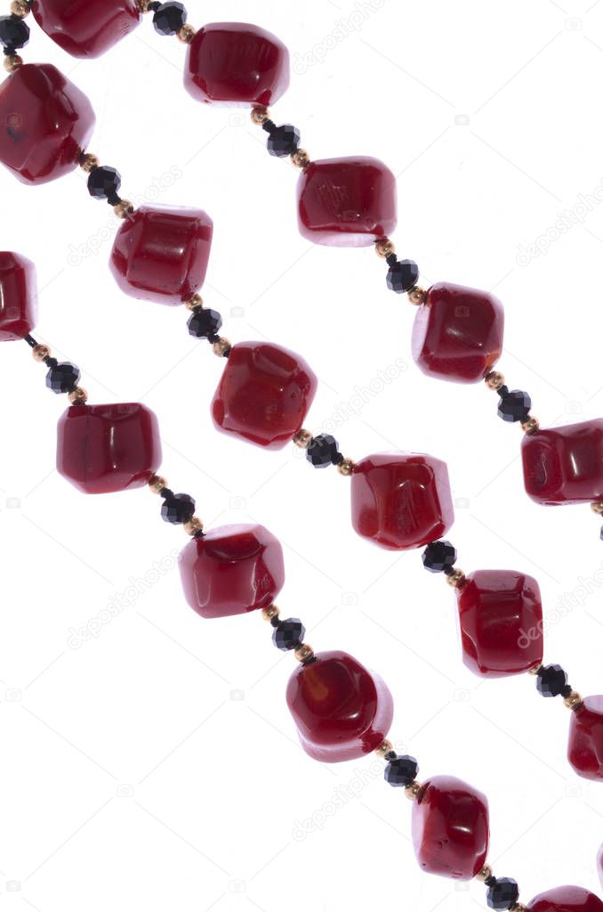 fragment of red beads on a white background