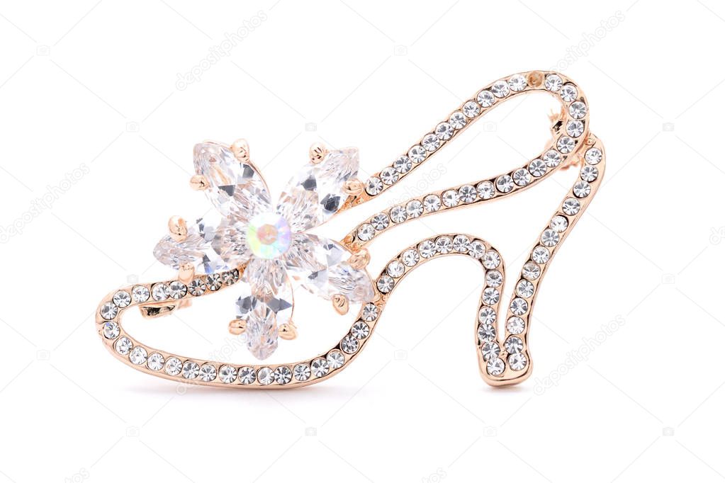 Brooch shoe on a white background