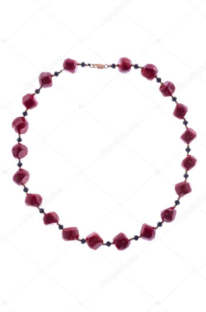 necklace with red beads on a white background