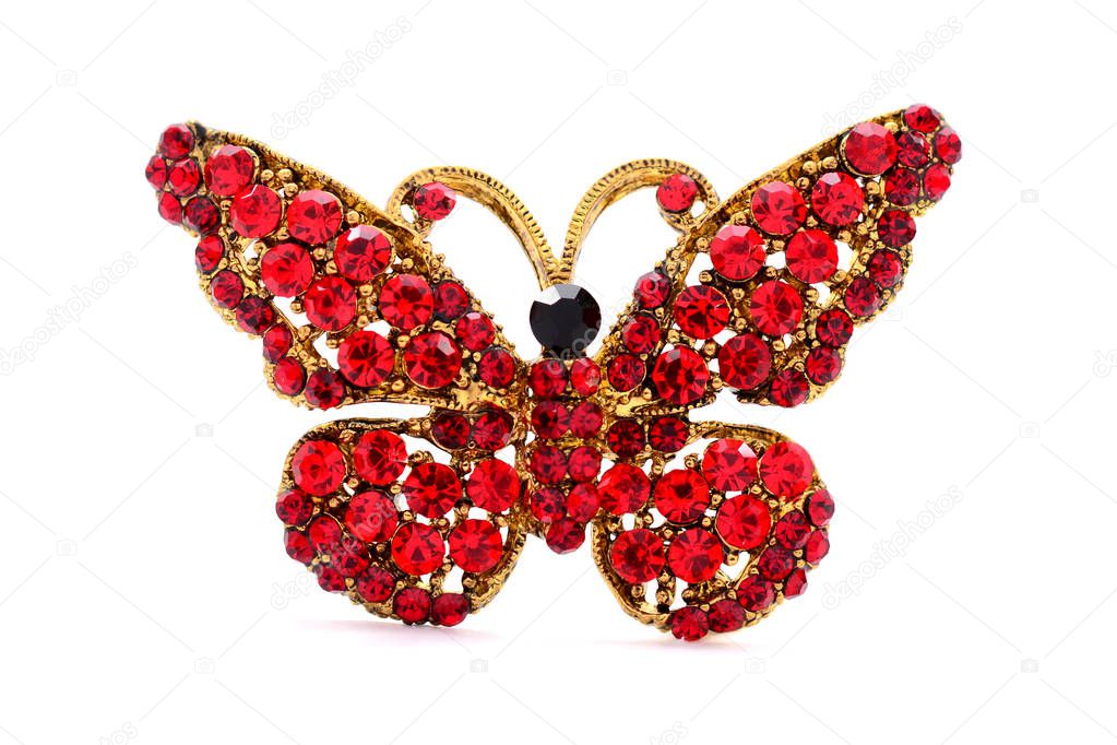 brooch in the form of a butterfly on a white background