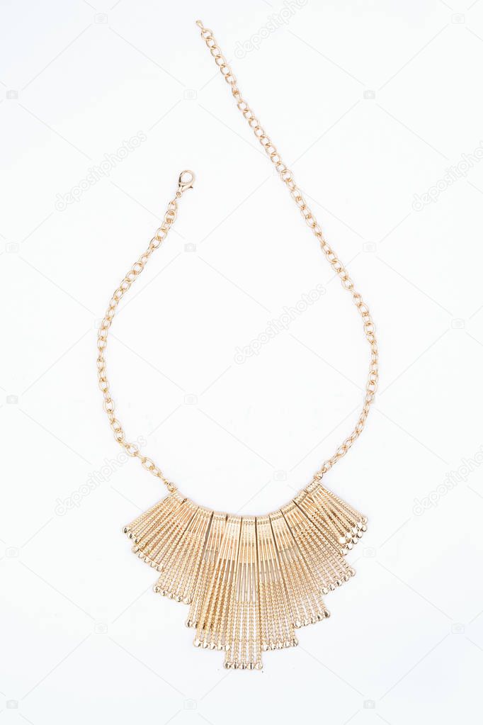 gold necklace isolated on white