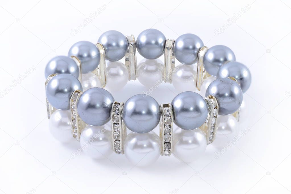 bracelet with pearls isolated on white