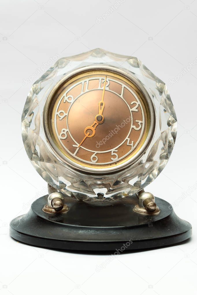 Crystal table clock on white background