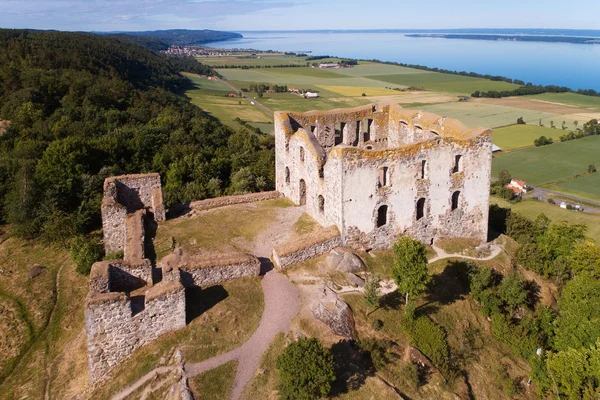 Aerial view of the Swedish Brahehus castle ruins overlooking lake Vattern near the town Granna.