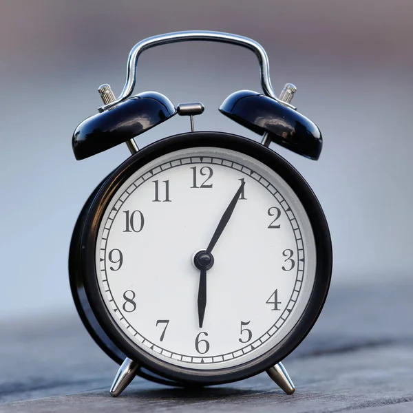 Close Retro Styled Black Alarm Clock Displaying Five Six — Stock Photo, Image