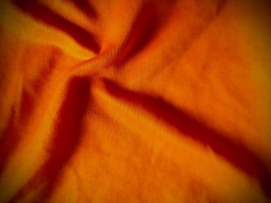 Safran renkli yumuşak ipek kumaş katları. Hinduizmin işaret rengi.