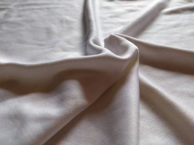 İpek kumaşla yapılmış bir desen tasarımı. Gölgeler ve ışık. Güzel Lüks katlar.