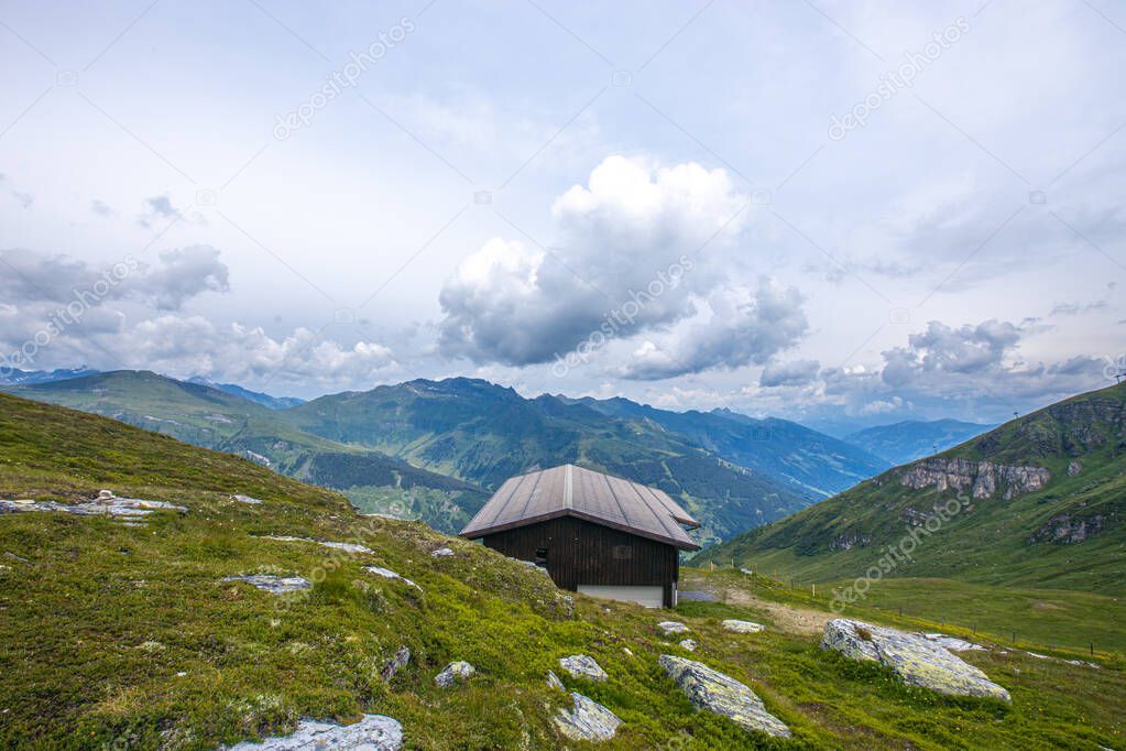 mountain hut in the mountains, landscape in the austrian mountains, swiss alpine village, alpine hut in the mountains, house in the mountains