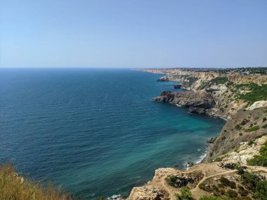 Dağdan deniz kıyısına manzara