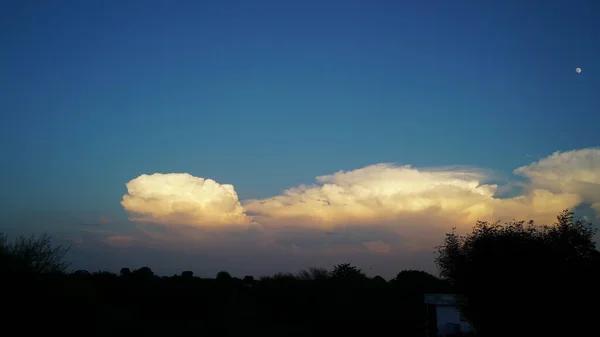 Wonderful golden clouds. Natural light on the sky in the evening