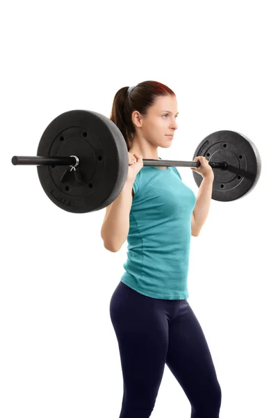 Hermosa chica haciendo ejercicio con una barra —  Fotos de Stock