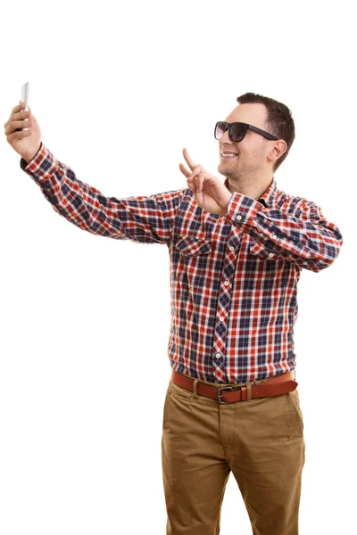 Cool young man taking a selfie — Stock Photo, Image