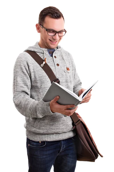 Leende manlig elev med en bok — Stockfoto