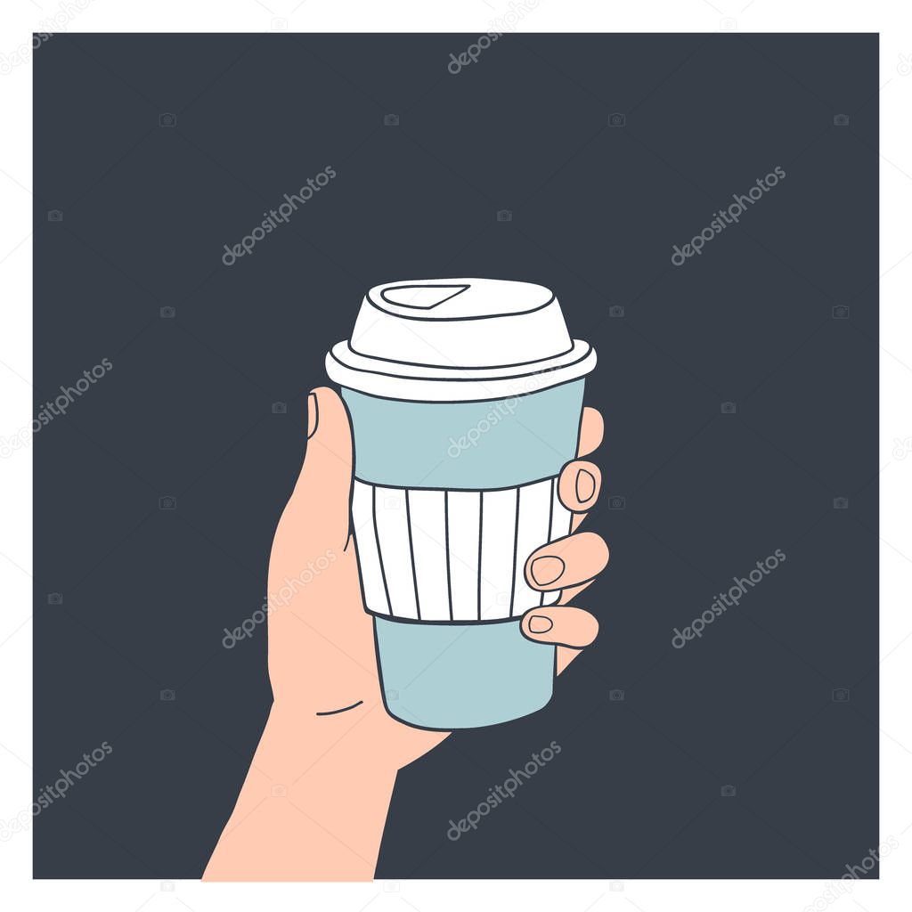Hand holding reusable coffee cup.