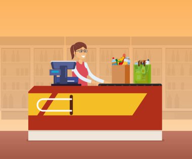 Kız kasiyer personel yazar kasa tezgahın arkasındaki.