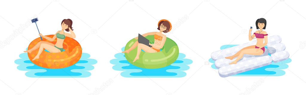 Young woman swiming inflatable ring air mattress,