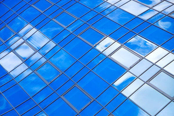 Reflection of the sky in the windows of the skycsraper