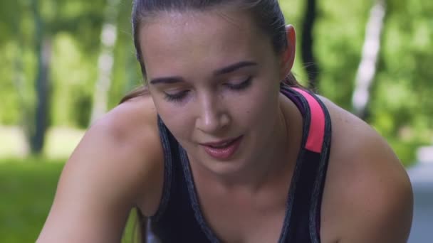 Female Sportsman Runner Wipes Sweat Hard Training Outdoors Slow Motion — Stock Video