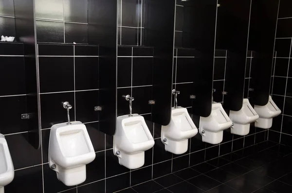 White Urinals Black Tiles — Stock Photo, Image