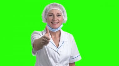 Başparmak gösterilmesini mutlu tıbbi işçi.