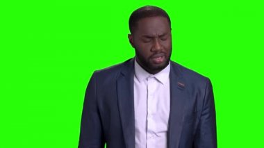 Onun kol saati kontrol başarılı iş adamı.