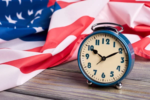USA flag and alarm clock. — Stock Photo, Image
