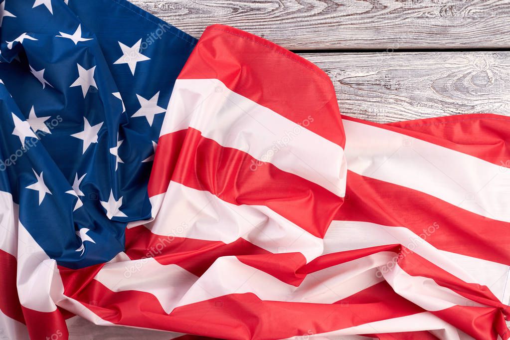 American flag on wooden table.