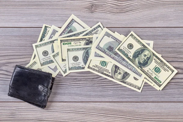 Black wallet and money. — Stock Photo, Image