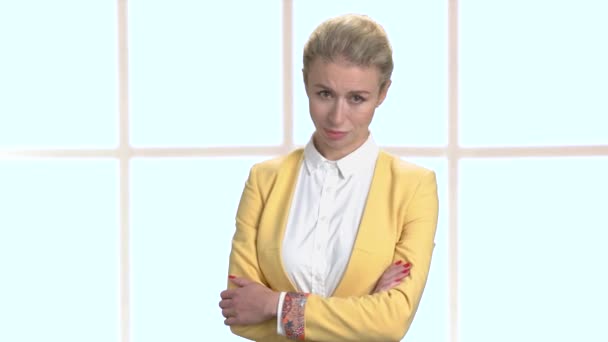 Unhappy blonde with arms crossed. — Stock Video