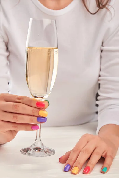 Young woman hands with glass of champagne. — Stock Photo, Image