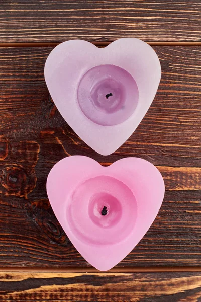 Scented heart shaped candles, top view.